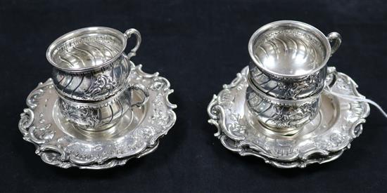 A set of four Austro-Hungarian silver coffee cups and saucers.